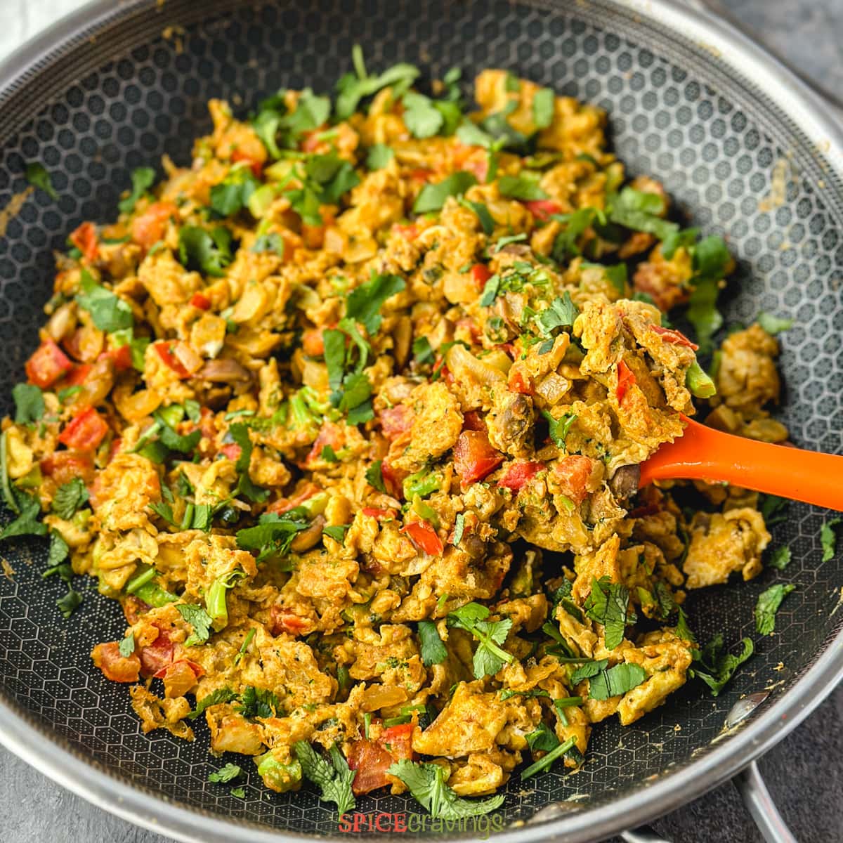 Egg Bhurji - indian scrambled eggs cooked with spice and Herbs