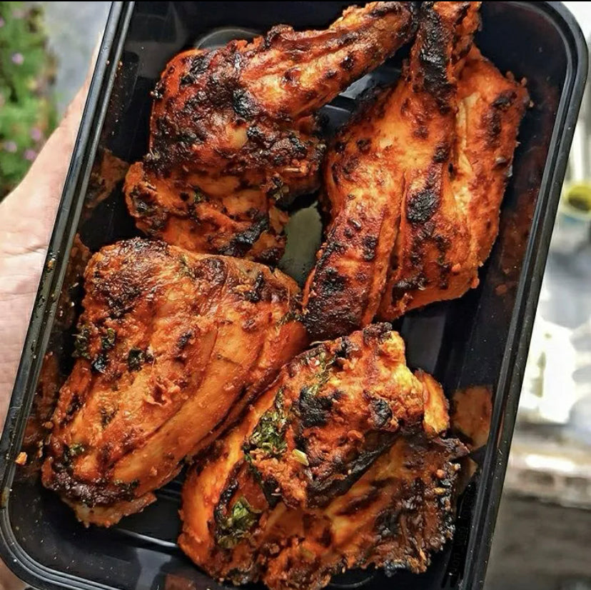 Chicken Tandoori- marinated with herbs and spice grilled in charcoal